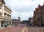 View toward Queen Victoria Square from Carr Lane. One cupola of the Hull Maritime Museum is visible centre-left; the white marble façade of the Ferens Art Gallery is visible centre-right. Copyright David Wright.