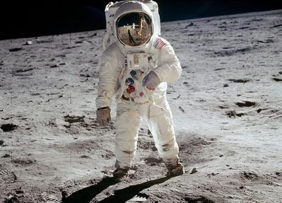 Articles by period... Buzz Aldrin poses on the Moon allowing Neil Armstrong to photograph both of them using the visor's reflection.