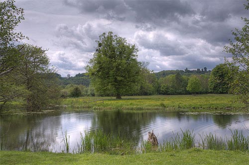 View from north bank of Thames over Magna Carta Island and water meadows towards Air Forces Memorial on horizon at left. Author: Antony McCallum Creative Commons Licensed.