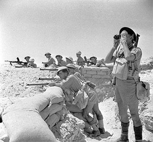 British Commonwealth infantry manning a sandbagged defensive position near El Alamein, 17 July 1942.