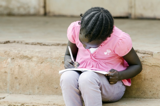 Primary student Africa. Shutterstock Photo ID: 324789629.