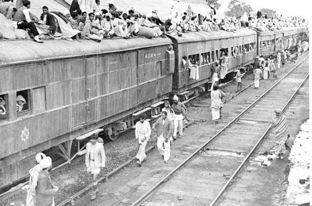A refugee special train at Ambala Station during partition of India. Photo Division, Government of India. Public Domain.