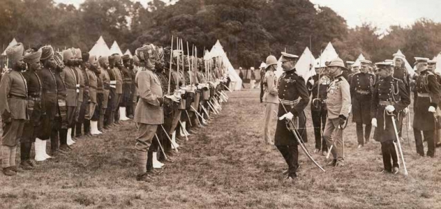 Field Marshal Kitchener inspecting Indian troops during the First World War. Chronicle / Alamy Stock Photo