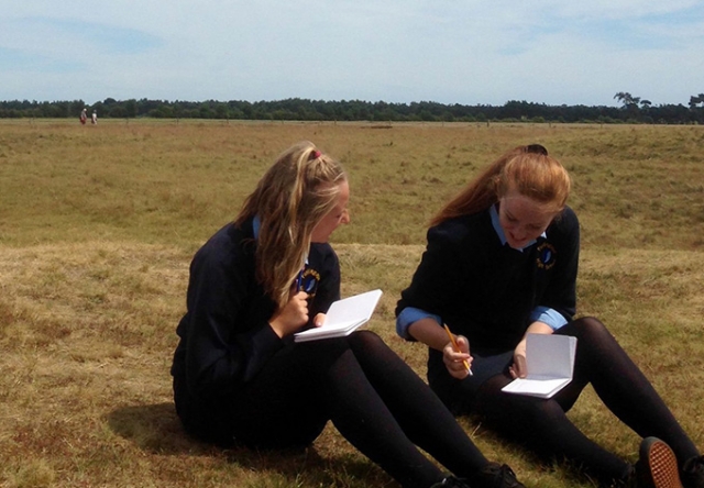 Imagining History Programme - girls writing at Sutton Hoo