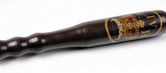 Painted police truncheon