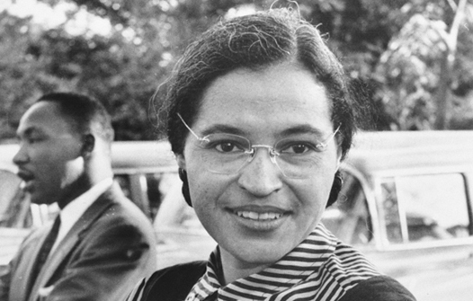 Photograph of Rosa Parks with Dr. Martin Luther King jr. (ca. 1955) Mrs. Rosa Parks altered the negro progress in Montgomery, Alabama, 1955, by the bus boycott she began. National Archives record ID: 306-PSD-65-1882 (Box 93). Public Domain.