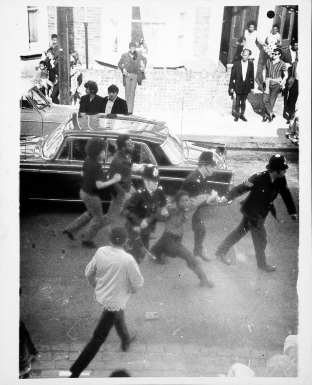 Althea Jones-Lecointe being arrested on 9 August 1970. Photographs such as these were used as evidence in the Mangrove trial. The central figure Althea Jones-Lecointe was part of the Mangrove Nine and one of the key organisers of the march on 9 August 1970. She was one of the key people to direct the Mangrove Nine’s radical defence strategy which included applying for an all black jury and exposing the contradictions in the prosecution’s case. Image: The National Archives, Catalogue reference: MEPO31-21 (1a)