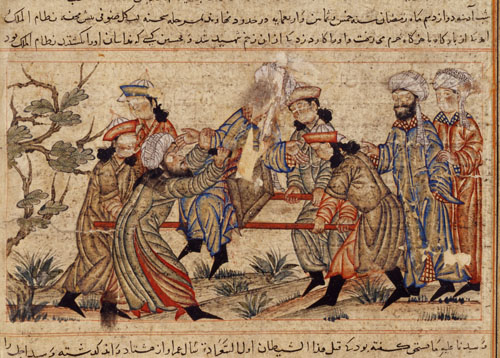 An agent of the Order of Assassins (left, in white turban) fatally stabs Nizam al-Mulk, a Seljuk vizier, in 1092. The faces in this depiction, which was contained in an illustrated 14th-century manuscript, were later scratched out (Topkapi Palace Museum, Cami Al Tebari TSMK, Inv. No. H. 1653, folio 360b)