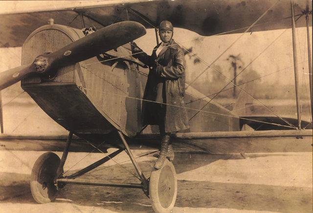 Bessie Coleman on the wheel of a Curtiss JN-4 ‘Jennie’ c. 1924