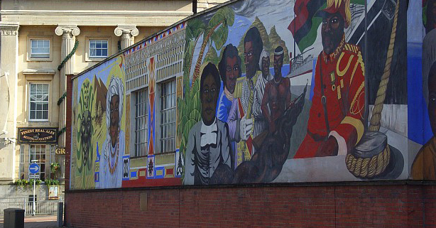 Black History Mural, Reading This shows about half the mural which is on the side of the Central Club in London Street. It was painted in 1990 by Alan Howard and members of the club. The building behind, now the Great Expectations Hotel, is the former Everyman Theatre. Andrew Smith / Black History Mural, Reading / CC BY-SA 2.0