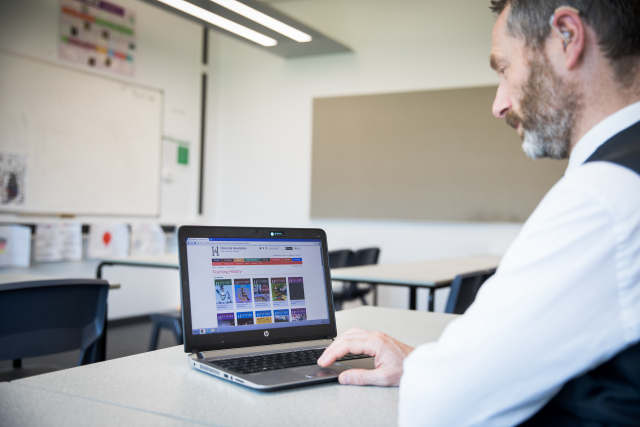 Teacher at laptop