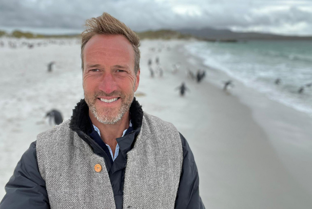 Competition judge Ben Fogle with penguins on the Falkland Islands