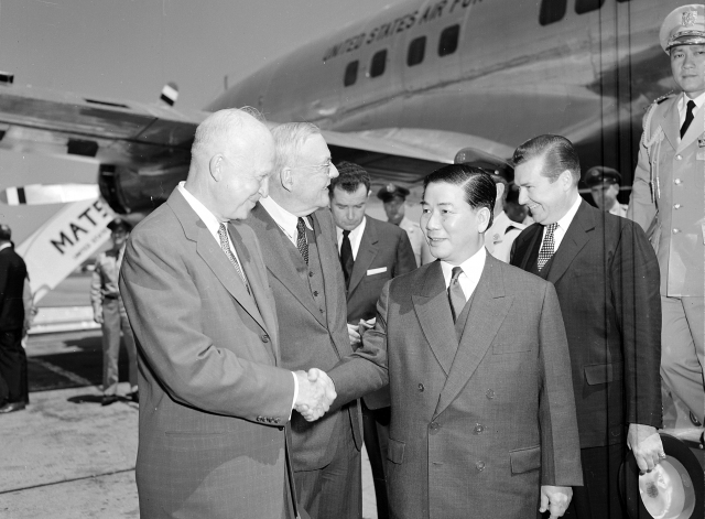 U.S. President Dwight D. Eisenhower and Secretary of State John Foster Dulles (from left) greet South Vietnamese President Ngo Dinh Diem at Washington National Airport. 05/08/1957
ARC Identifier: 542189
Item from Record Group 342: Records of U.S. Air Force Commands, Activities, and Organizations, 1900 - 2000
