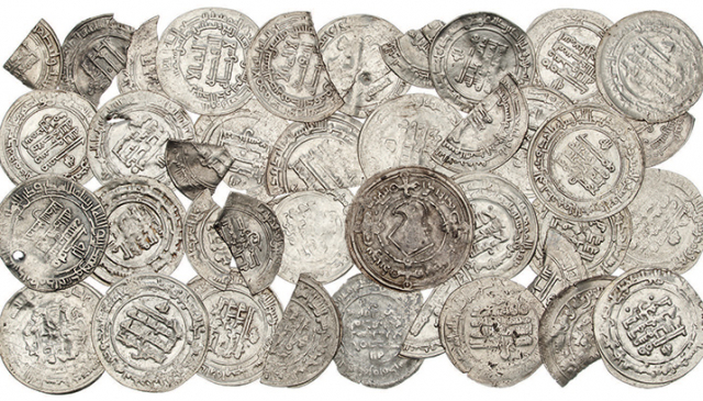 40 silver coins from a hoard which contained a total of 1,371. Photograph: Ola Myrin, Historiska museet/SHM (CC BY 4.0)