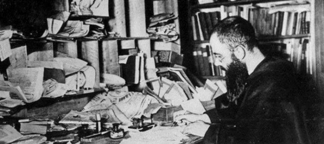 St Maximilian Kolbe at his desk (Image: https://romancatholicman.com/wp/st-maximilian-kolbe-spiritual-warrior-master-new-media-messy-desk)