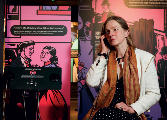 Franziska Schroeder listening to Marion Canning’s fictionalised story, Bad Bridget Exhibition (Courtesy of Ulster American Folk Park)
